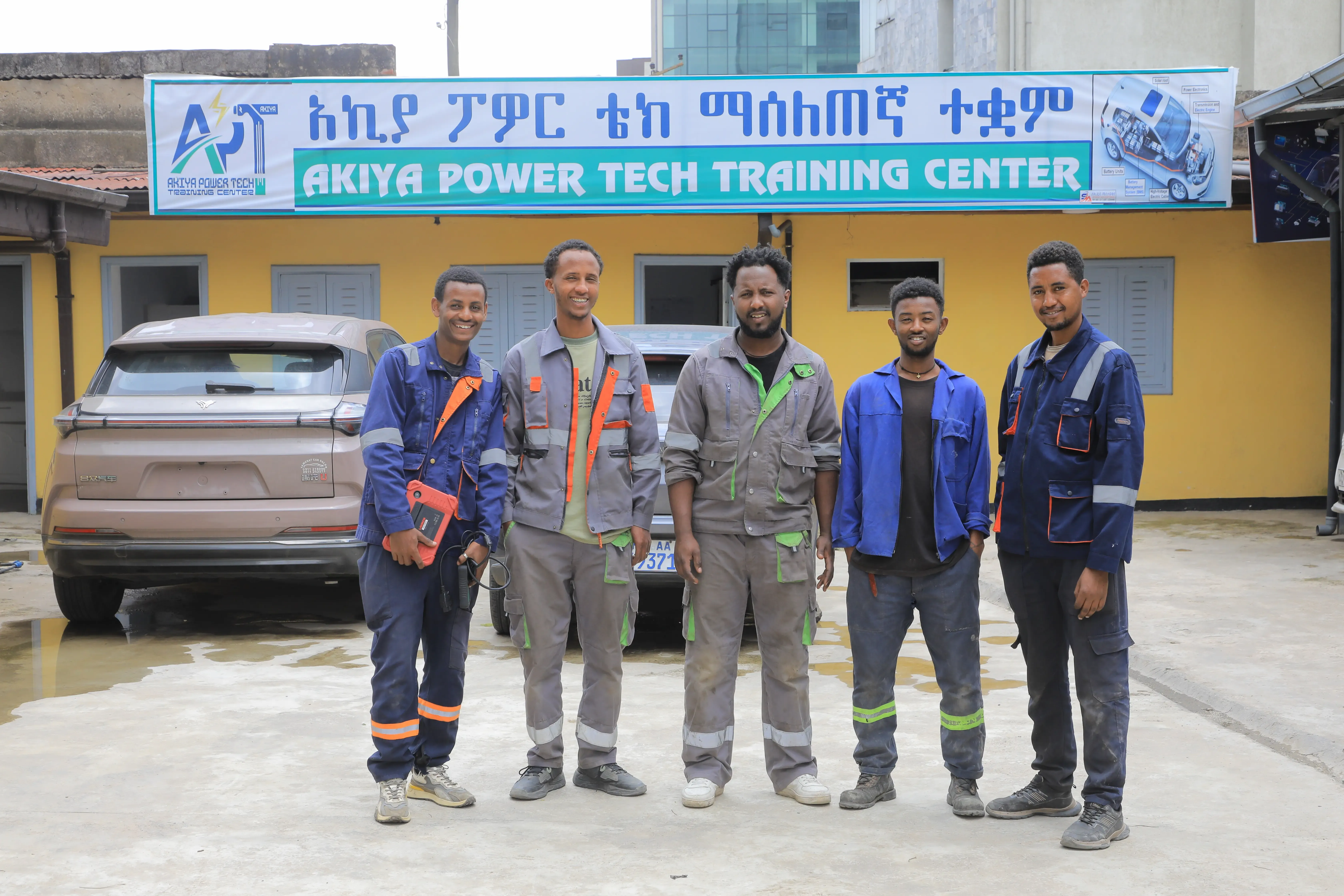 A student working on an EV at Akiya Power Tech